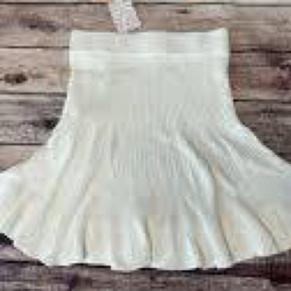 Free People “Solid Gold” Cream Ribbed Knit Mini Skirt